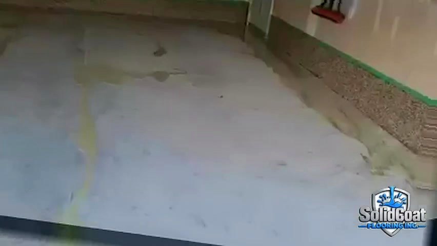 Garage floor before SolidCoat epoxy installation