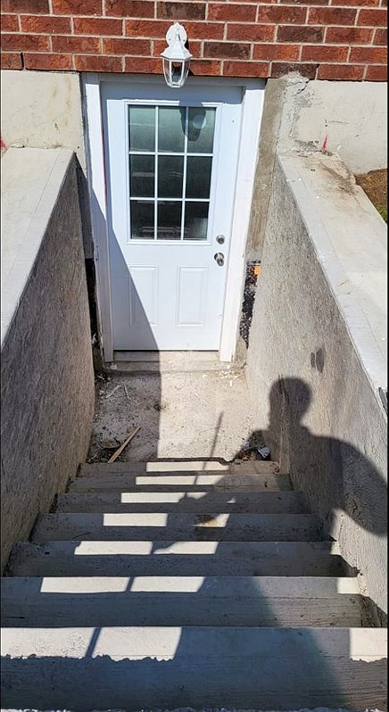 Basement walkout stairs before coating
